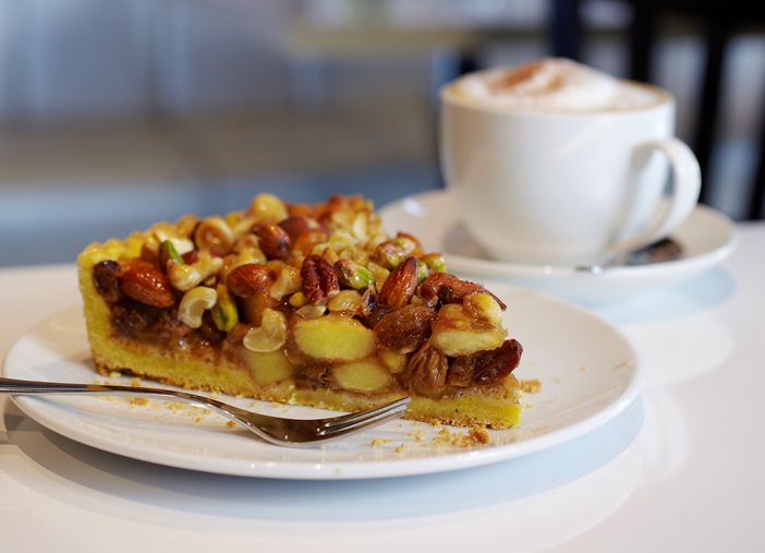 Bij veel MultiVlaai winkels kun je genieten van een kopje koffie met een lekkere punt vlaai.